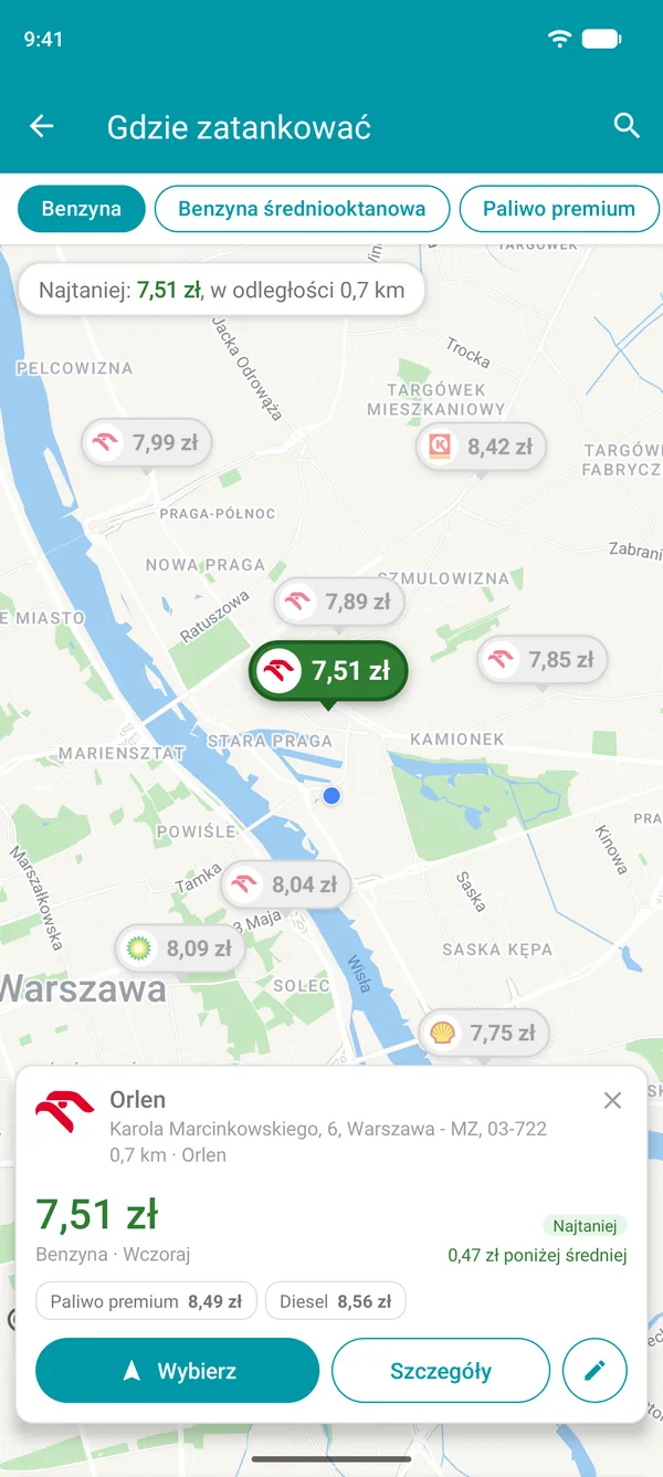 Widok najtańszej stacji w aplikacji Drivvo z cenami paliw, odległością i przyciskiem Wybierz