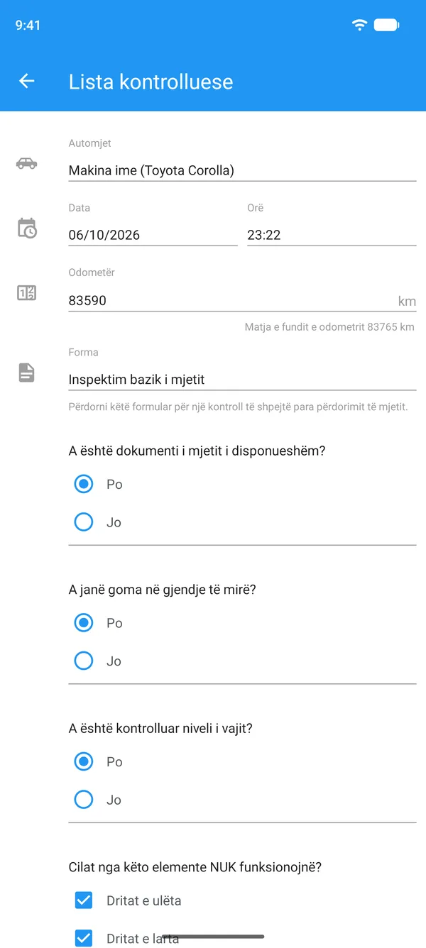 Listë kontrolluese e automjetit e plotësuar në telefon, me automjetin, leximin e odometrit dhe përgjigjet po ose jo